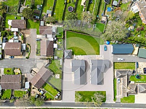 Aerial top down view of a pair of new detached bungalows.