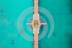 Aerial top down view about people swimming in the thermal bath.