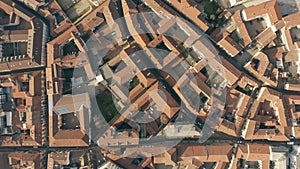 Aerial top down view of streets and tiled houses in Alessandria. Piedmont, Italy