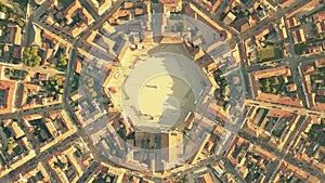 Aerial top down view of tiled roofs of symmetric Palmanova town, Italy