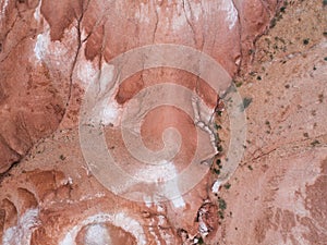 Aerial top down view on Zhangye Rainbow mountains displaying colorful pattern