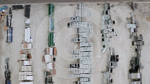 Aerial top drone view of the outside storage, open warehouse, of loose bulk on the dry mix batch plant