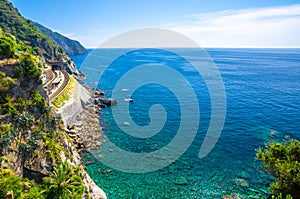 Aerial top panoramic view of Ligurian Sea and Manarola train station, coastline with rocks and cliffs of Riviera di Levante, Natio