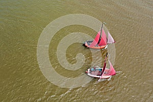 Aerial top shot from traditional dutch wooden boats at the IJsselmeer near the harbor from Laaxum in Friesland the Netherlands