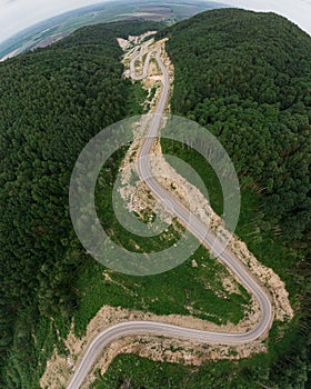 Aerial top vew of winding road in the mountains