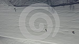 Aerial top view of alpine skiing downhil piste