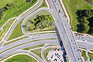 Aerial top view of asphalt road intersection. city highway in sunny day