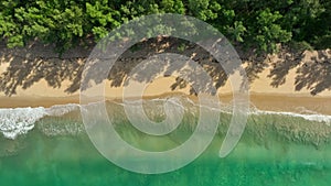 Aerial top view of beautiful sea with wave crushing to the beach