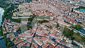 Aerial top view of Beziers town architecture and cathedral from above, France