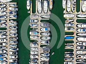 Aerial top view of boats and yachts in marina