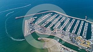 Aerial top view of boats and yachts in modern marina from above, Mediterranean sea, France