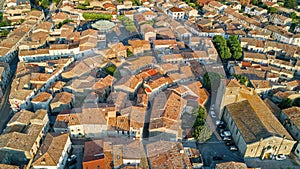 Aerial top view of Bram medieval village architecture and roofs from above, France