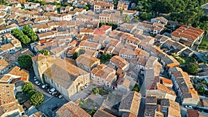 Aerial top view of Bram medieval village architecture and roofs from above, France