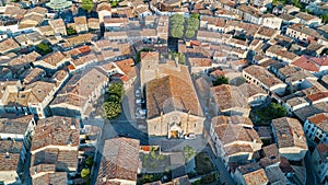 Aerial top view of Bram medieval village architecture and roofs from above, France