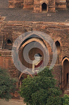 Aerial top view of burmese temples of Bagan City from a balloon, unesco world heritage with forest trees, Myanmar or Burma.