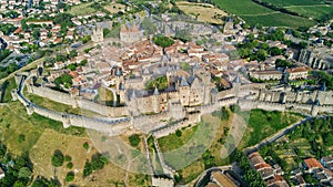 Aerial top view of Carcassonne medieval city and fortress castle from above, France