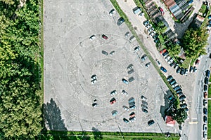 Aerial top view of cars in parking lot