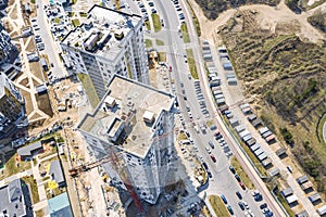 Aerial top view of city construction site. construction of new modern multistory buildings