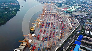 Aerial top view of container cargo ship in the export and import