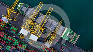 Aerial top view container cargo ship unloading in import export business logistic and transportation of international by container