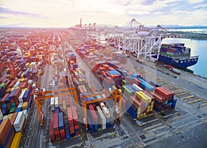 Aerial top view container in port warehouse waiting for export .