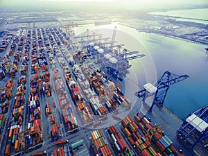 Aerial top view container in port warehouse waiting for export .