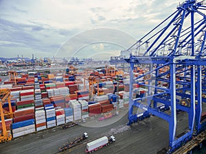 Aerial top view container in port warehouse waiting for export .