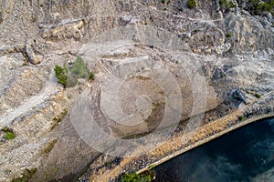 aerial top view of a disused open pit wolfram mine