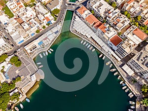 Aerial top view by drone of Voulismeni Lake in Agios Nikolaos city. Greece, Crete