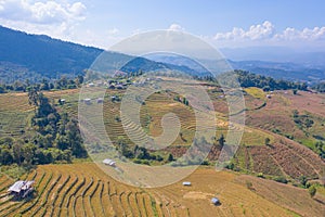 Aerial top view of dry paddy rice terraces, green agricultural fields in countryside, mountain hills valley in Asia, Pabongpieng,