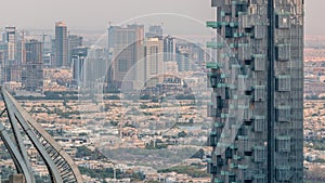 Aerial top view of Dubai Marina evening timelapse. photo