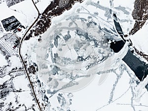 Aerial Top view of Frozen Golcuk lake at Odemis Bozdag in winter season