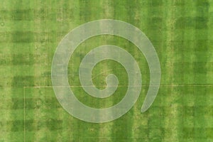 Aerial Top view of Green grass soccer field background