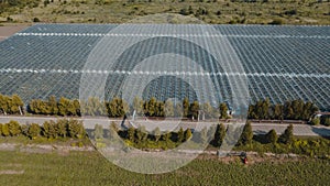 Aerial top view of greenhouse plant. Agronomy, year-round climate control and yield, indoor farming, heat recovery, power