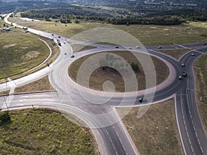 Aerial Top View of highway intersection junction summer morning with car