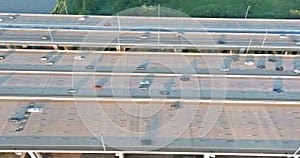 Aerial top view of huge complex road junction at cars driving on the Alfred E. Driscoll Bridge across the Raritan River