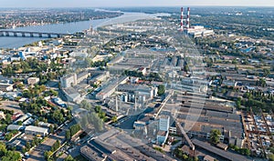 Aerial top view of industrial park zone from above, factory chimneys and warehouses, industry district