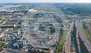 Aerial top view of industrial park zone from above, factory chimneys and warehouses, industry district in Kiev, Ukraine photo