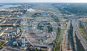 Aerial top view of industrial park zone from above, factory chimneys and warehouses, industry district in Kiev, Ukraine