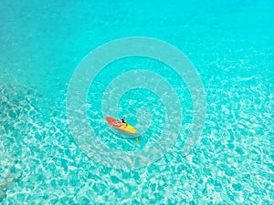 Aerial top view Kayak boat turquoise blue water sea. Concept travel