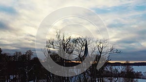 Aerial Top View of the Krimulda Evangelic Lutheran Church in Winter at Sunrise