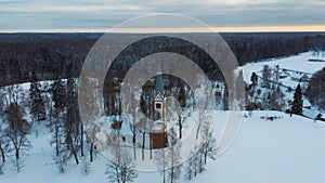 Aerial Top View of the Krimulda Evangelic Lutheran Church in Winter at Sunrise