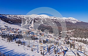 Aerial top view landscape Sheregesh ski lift resort winter, mountain and hotels, Russia Kemerovo region