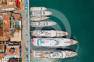 Aerial top view of luxury yachts in Puerto Banus marina, Marbella, Spain