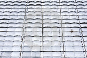 Aerial top view of modern industrial roof of warehouse building