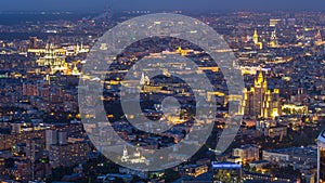 Aerial top view of Moscow night timelapse after sunset. Form from the observation platform of the business center of photo