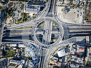 Aerial top view of multilevel junction ring road as seen in Attiki Odos, Athens photo