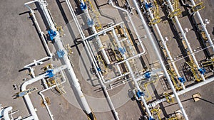 Aerial top view natural gas pipeline, gas industry, gas transport system, stop valves and appliances for gas pumping station. photo