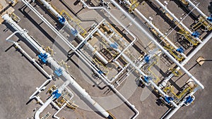 Aerial top view natural gas pipeline, gas industry, gas transport system, stop valves and appliances for gas pumping station. photo