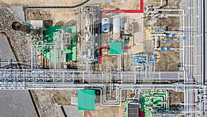 Aerial top view natural gas pipeline, gas industry, gas transport system, stop valves and appliances for gas pumping station